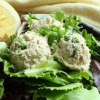 Tuna Over Green Salad · White tuna, celery and lite mayonnaise over green salad.