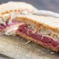 The Reuben · Hot pastrami or corned beef mixed with coleslaw, melted swiss cheese, and Russian dressing o...