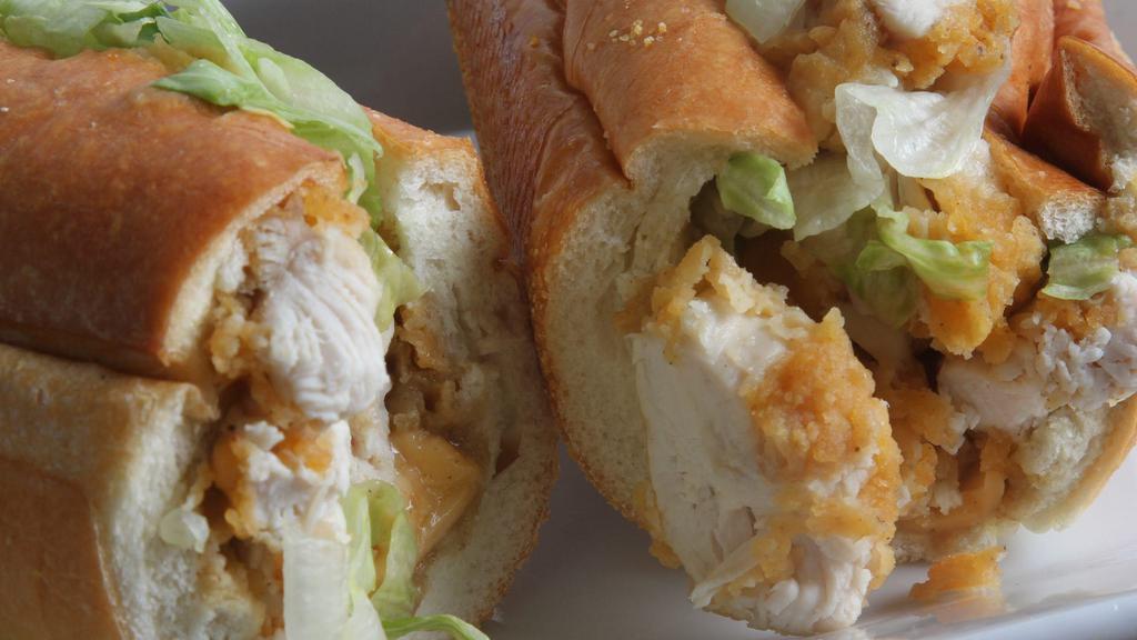 Cajun Chicken Sub With Cheddar Cheese · Lettuce, tomato, and honey mustard on toasted hero.