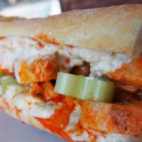 Buffalo Bleu Sandwich · Grilled chicken breast with buffalo sauce, lettuce, tomato, and blue cheese dressing.