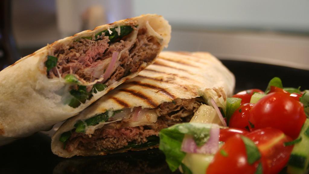 Roast Beef Wrap · Roast beef, cheddar cheese, lettuce, tomato, and Russian dressing on wrap.