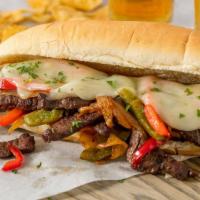 Philly Cheese Steak Sandwich · Thinly sliced beef steak with grilled peppers and onion with melted cheese. Choice of cheese...