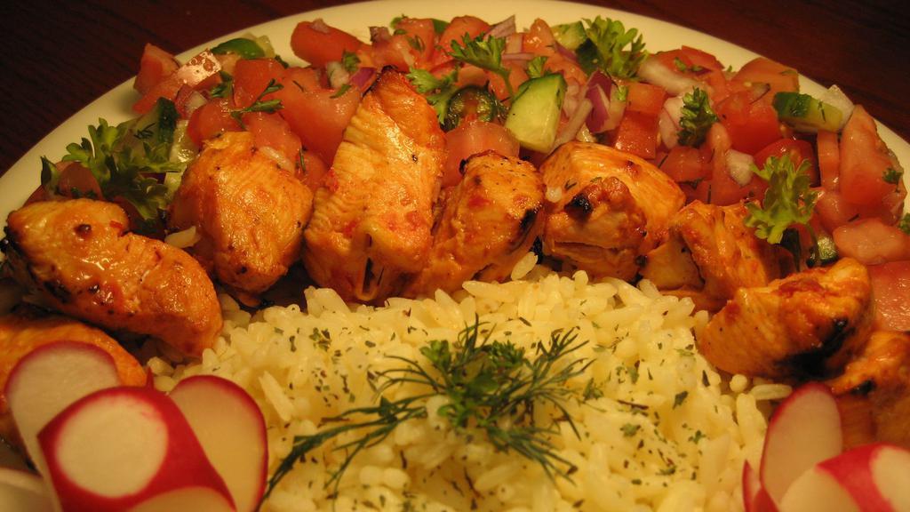 Chicken Kabab Platter · Grilled marinated chicken breast with grilled tomato, pepper, and onion. Served over rice or salad.