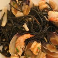 Spaghetti Nero Ai Frutti Di Mare · Black spaghetti, clams, shrimp, sea scallops, squid, garlic oil. Choice of white or red sauce.