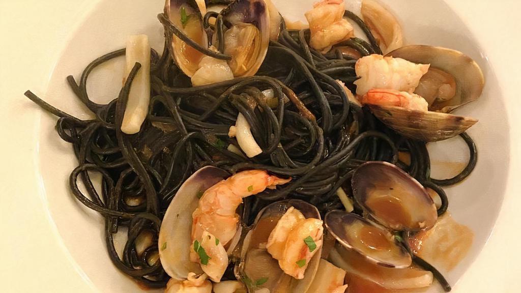 Spaghetti Nero Ai Frutti Di Mare · Black spaghetti, clams, shrimp, sea scallops, squid, garlic oil. Choice of white or red sauce.