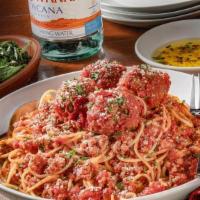 Spaghetti & Meatballs · Four freshly prepared hand-crafted meatballs served over spaghetti with house-made pomodoro ...