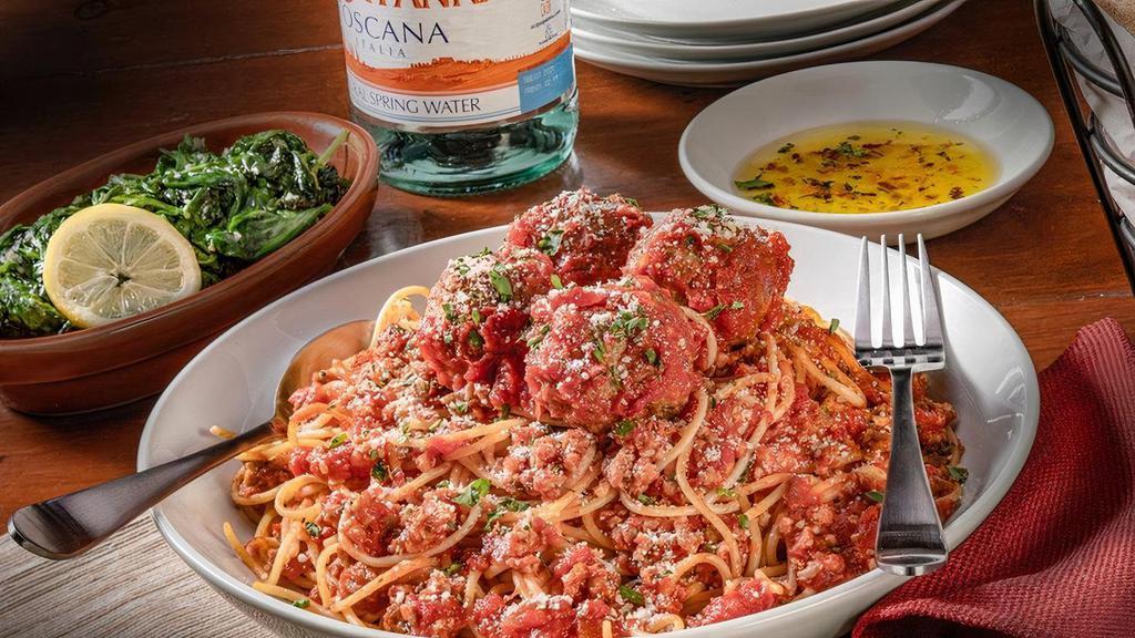 Spaghetti & Meatballs · Four freshly prepared hand-crafted meatballs served over spaghetti with house-made pomodoro sauce.