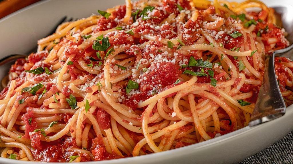 Spaghetti Pomodoro · Spaghetti served with house-made pomodoro sauce