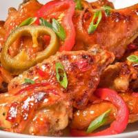 Twice-Baked Brick Oven Honey Chili Wings  · Tossed in spicy chili honey & pickled hot cherry peppers.