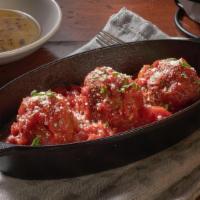 Meatballs · Three freshly prepared hand-crafted meatballs topped with house-made pomodoro.