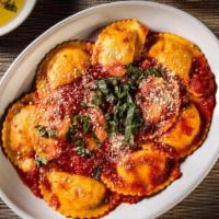 Four Cheese Ravioli · Home-style with ricotta, Parmesan, Pecorino Romano & Fontina cheese tossed with house-made p...