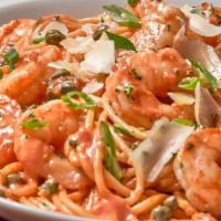 Shrimp Rossini · Sautéed shrimp, capers, a hint of hot pepper & tomato cream sauce, tossed with spaghetti, sh...