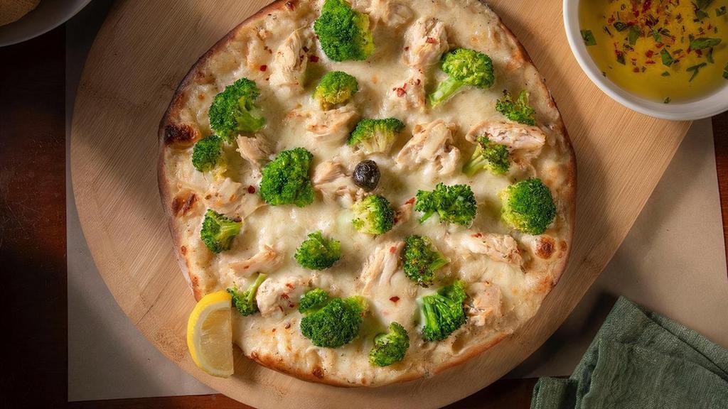 Roasted Chicken & Broccoli · Roasted chicken, marinated broccoli, mozzarella, Pecorino Romano & lemon pepper cream sauce.