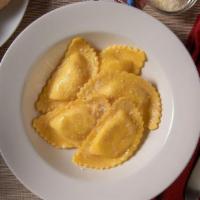 Kids Cheese Ravioli · Cheese-filled ravioli tossed in your choice of tomato sauce or butter.