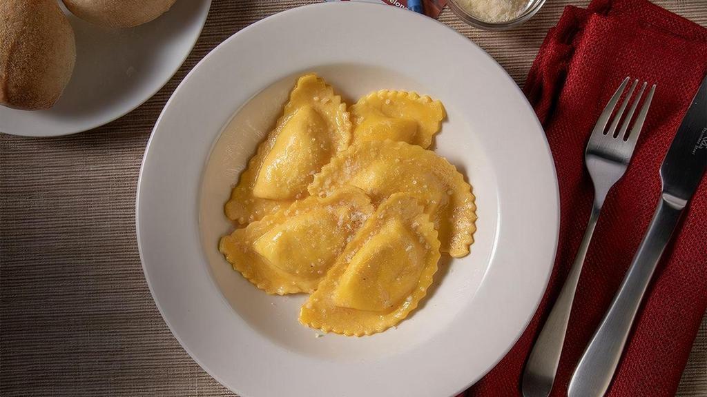 Kids Cheese Ravioli · Cheese-filled ravioli tossed in your choice of tomato sauce or butter.