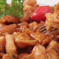 Lambi · Tenderized ocean conch stewed in creole sauce , with white rice or rice and beans
