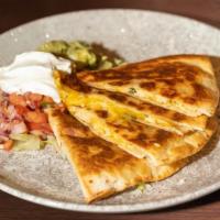 Chicken + Cheese Quesadilla · Chicken breast, cheddar-jack cheese and tortilla.