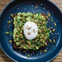 Avocado Smash · Avocado & feta mash, on think multigrain toast, topped with pepitas, chili flakes, and mint.