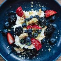 Sweet Uncle Fred · Toasted homemade banana bread topped with marscapone, fresh berries, almond brittle, lime ze...
