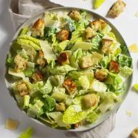 Caesar Salad · Romaine lettuce, parmesan cheese, and croutons with caesar dressing.