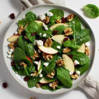 Apple Walnut Salad · Apples, walnuts, cranberries, and goat cheese with your choice of greens and dressing.