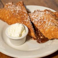 Ricottella · Fried dough filled with Nutella and ricotta.