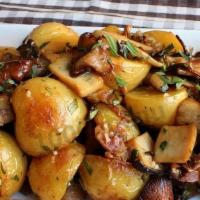 Roasted Potatoes With Mushrooms · Potatoes, mushrooms & spices.