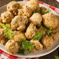 Fried Mushrooms · Breaded mushrooms then crisped to perfection.