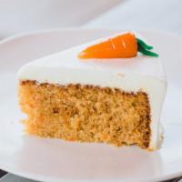 Carrot Cake · Moist cake, spiced with cinnamon and frosted with cream cheese frosting.