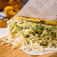The Beauty Queen Arepa · Pulled chicken, avocado, cilantro mayo and mustard.