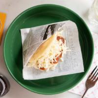 Arepa De Queso · Warm arepa with queso fresco and butter.