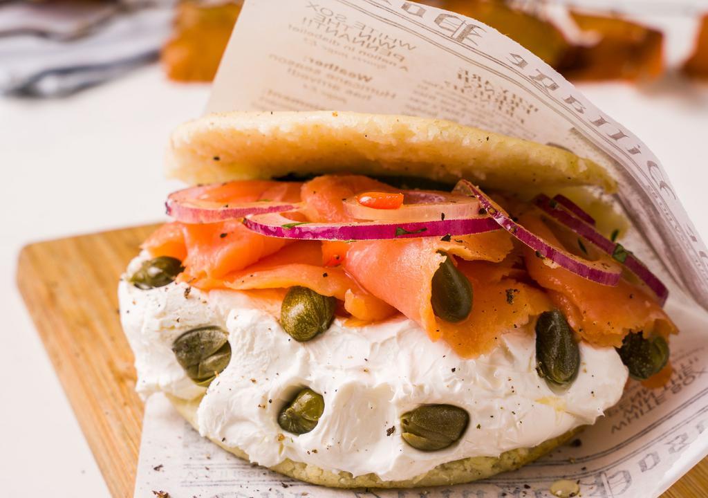 The New Yorker Arepa · Smoked salmon, cream cheese, avocado, red onion and capers.