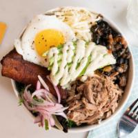 Pulled Pernil Bowl · White Rice, Black Beans, Avocado, Salad, Fresh Red Onions, Shredded Cheese, Marinated Pulled...