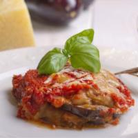 Eggplant Parmesan · Our amazing freshly breaded eggplant in an amazing tomato basil sauce and cheese.