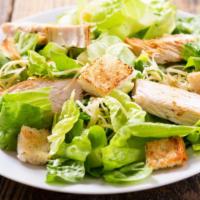 Caesar Salad · Crispy romaine lettuce topped with fresh parmesan cheese and crunchy croutons.