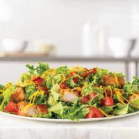 Crispy Chicken Salad · Crispy chicken and diced pepper bacon on a bed of chopped fresh lettuce with diced tomatoes ...