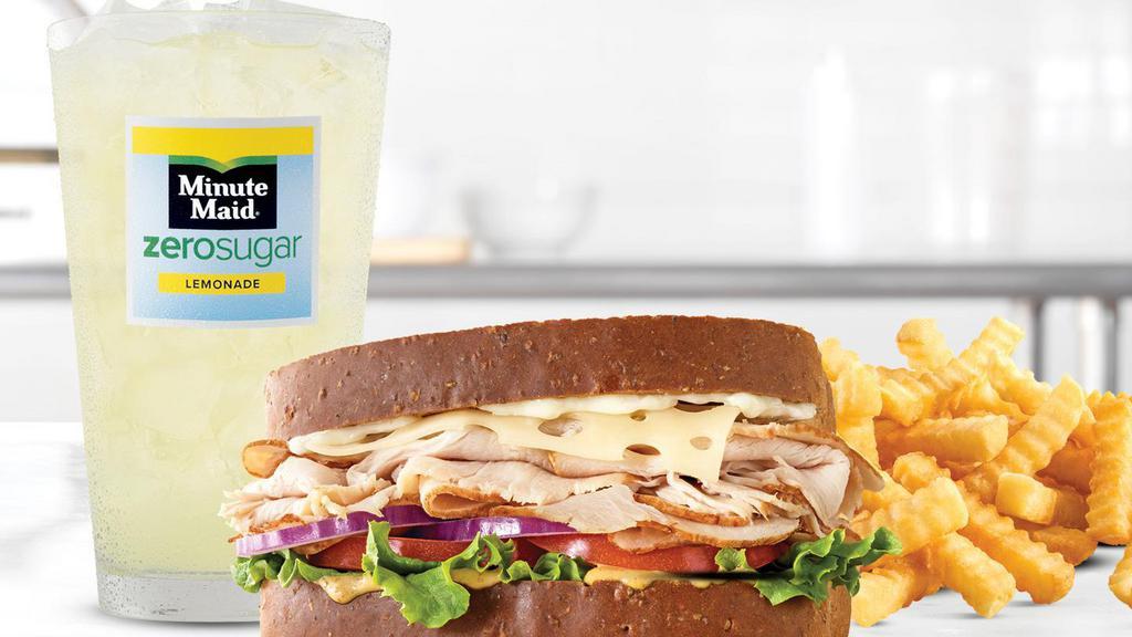 Roast Turkey & Swiss · Sliced roast turkey with Swiss cheese, lettuce, tomato, red onion, spicy brown honey mustard and mayo on thick sliced honey wheat bread. Visit arbys.com for nutritional and allergen information.