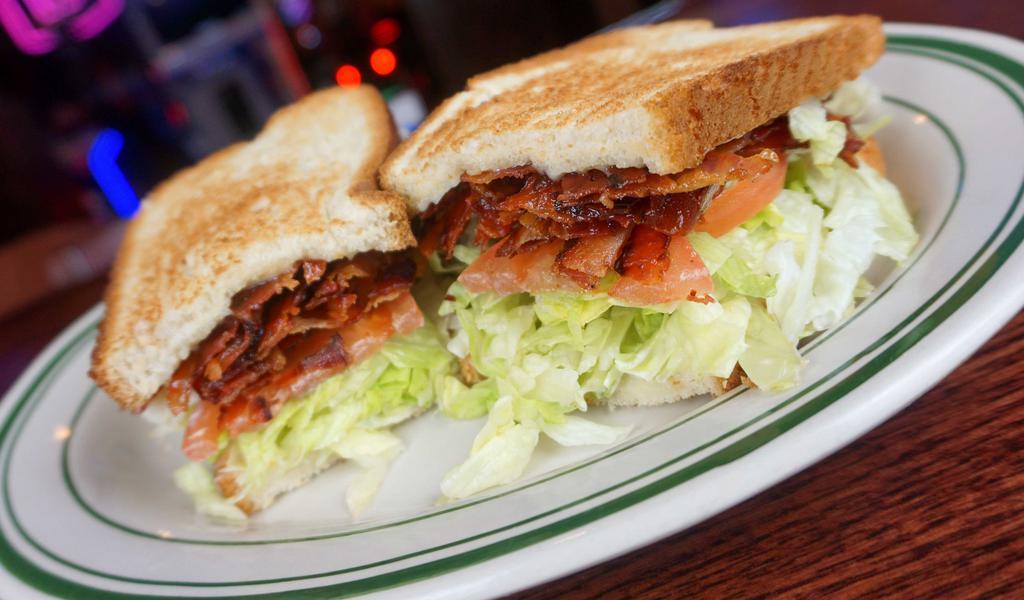 The Ultimate Blt · Crisp bacon, lettuce, tomato and mayo on country white bread.