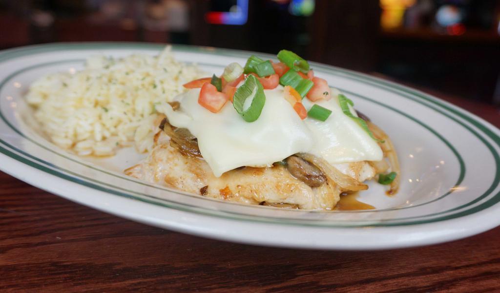 Smothered Chicken (Gs) · Two chicken breasts smothered with onions, peppers, mushrooms, melted American cheese and topped with diced tomatoes. Served with choice of potato and coleslaw.