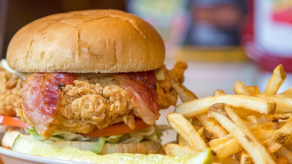 Ranch Chicken · Chicken breast hand battered and lightly fried. Topped with American cheese, lettuce, tomato, bacon and Tully's ranch dressing.