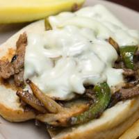 Cheese Steak · Sliced sirloin topped with onions, peppers, mushrooms and melted American cheese.