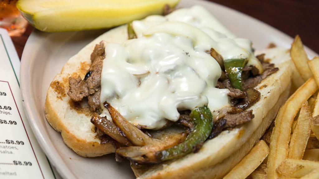 Cheese Steak · Sliced sirloin topped with onions, peppers, mushrooms and melted American cheese.