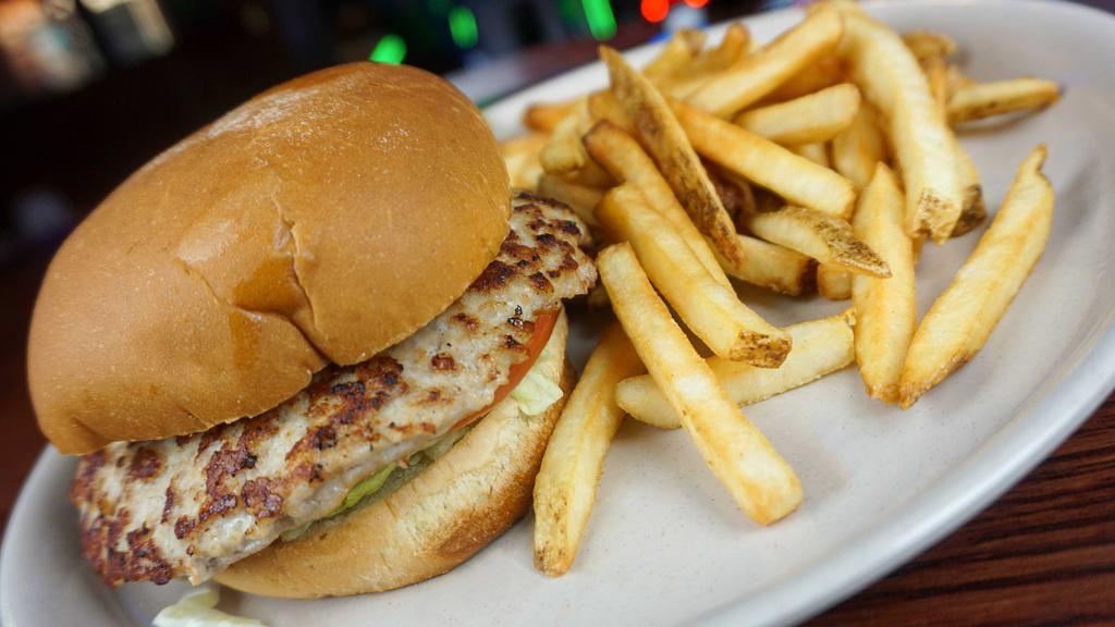 Turkey Burger · 1/2 lb. juicy ground seasoned turkey grilled with lettuce and tomato.