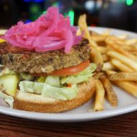Garden Burger · 1/4 Lb meatless burger with pickled red onions, lettuce, tomato, mustard, ketchup and pickles.
