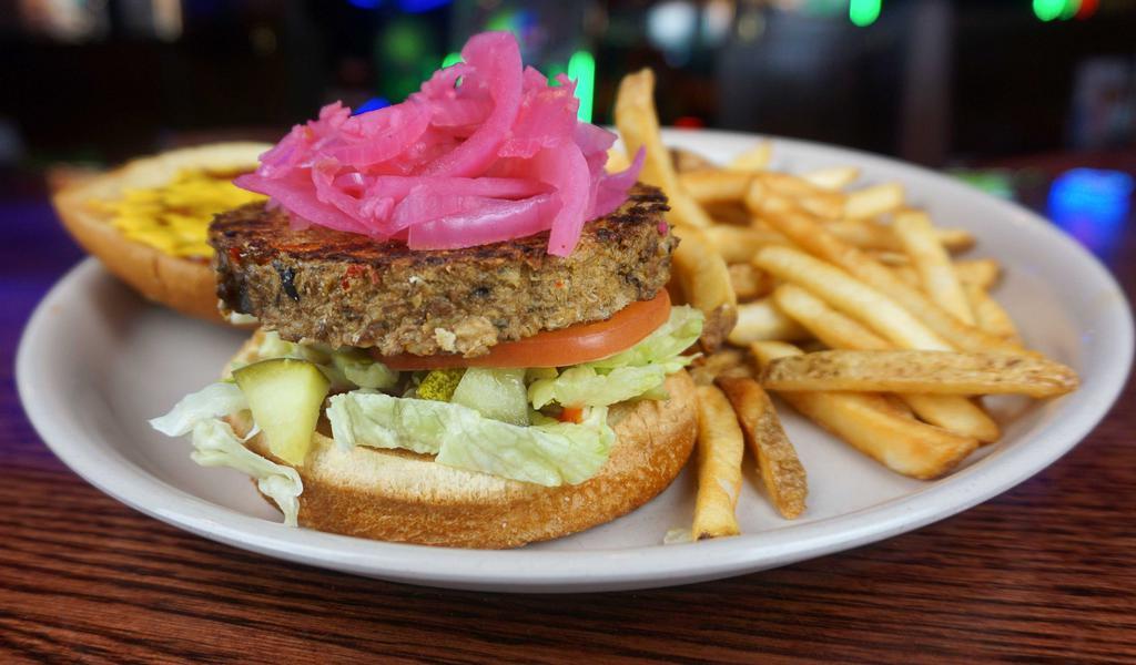 Garden Burger · 1/4 Lb meatless burger with pickled red onions, lettuce, tomato, mustard, ketchup and pickles.