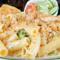 Cheesy Chicken Broccoli Bake · Homemade cheddar cheese sauce tossed with tender chicken, ziti and broccoli. Topped with our...