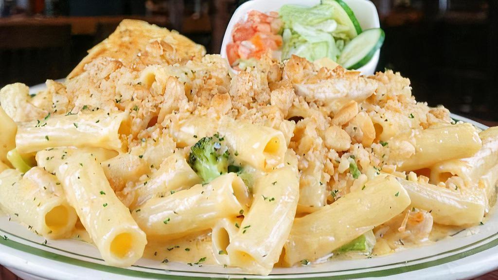 Cheesy Chicken Broccoli Bake · Homemade cheddar cheese sauce tossed with tender chicken, ziti and broccoli. Topped with our buttery crumb topping.