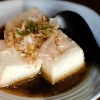 Agedashi Tofu · Light fried Soft Tofy with Bonito Flakes, Green Onions, Ginger, and Daikon served with Dashi...