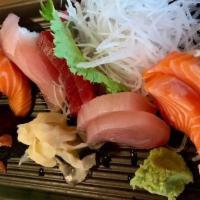 Sushi & Sashimi Deluxe · Eight pieces sushi - tuna, salmon, yellowtail, shrimp, daily catch, sea urchin (uni), ono, a...