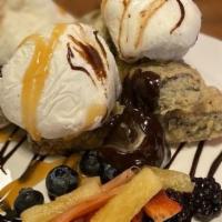 Brownie Tempura · Homemade brownie tempura topped with fresh chopped fruits, chocolate, and macadamia nuts ser...
